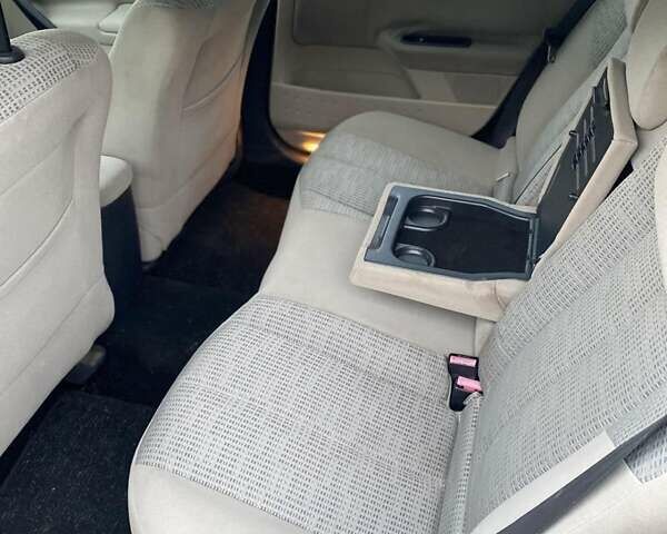 Синий Рено Меган, объемом двигателя 1.6 л и пробегом 229 тыс. км за 4850 $, фото 11 на Automoto.ua