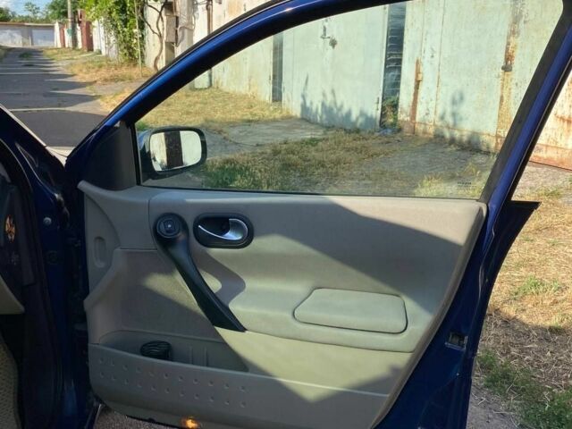 Синій Рено Меган, об'ємом двигуна 2 л та пробігом 309 тис. км за 4680 $, фото 4 на Automoto.ua