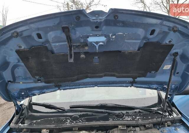 Синий Рено Меган, объемом двигателя 1.5 л и пробегом 187 тыс. км за 8700 $, фото 17 на Automoto.ua