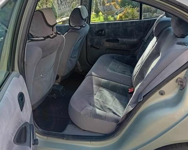 Зелений Рено Меган, об'ємом двигуна 1.6 л та пробігом 375 тис. км за 2200 $, фото 4 на Automoto.ua