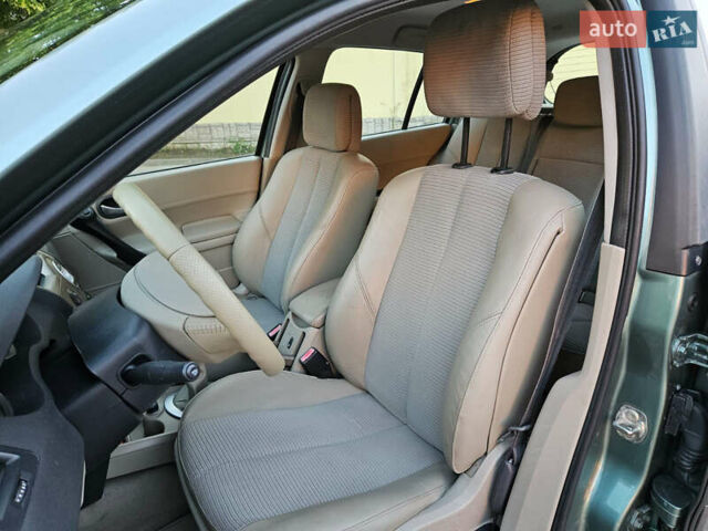 Зеленый Рено Меган, объемом двигателя 1.6 л и пробегом 221 тыс. км за 4999 $, фото 12 на Automoto.ua