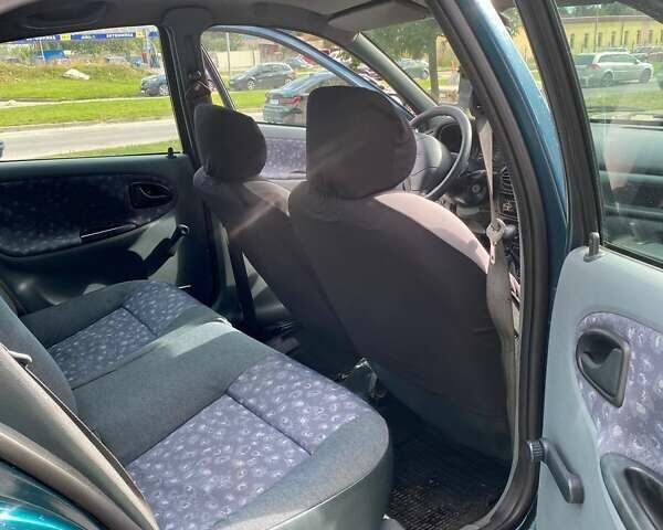 Зелений Рено Меган, об'ємом двигуна 1.4 л та пробігом 288 тис. км за 1750 $, фото 7 на Automoto.ua