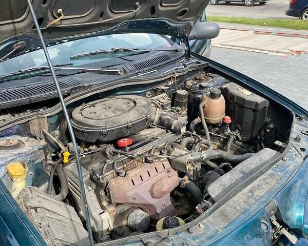 Зелений Рено Меган, об'ємом двигуна 1.4 л та пробігом 288 тис. км за 1750 $, фото 2 на Automoto.ua