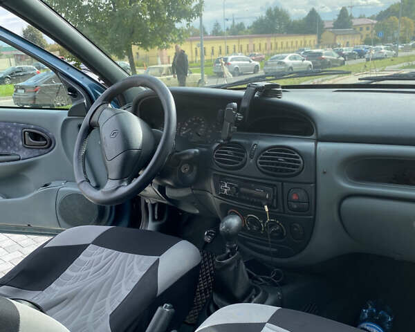 Зеленый Рено Меган, объемом двигателя 1.4 л и пробегом 290 тыс. км за 2000 $, фото 11 на Automoto.ua