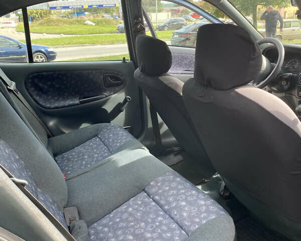 Зеленый Рено Меган, объемом двигателя 1.4 л и пробегом 290 тыс. км за 2000 $, фото 12 на Automoto.ua