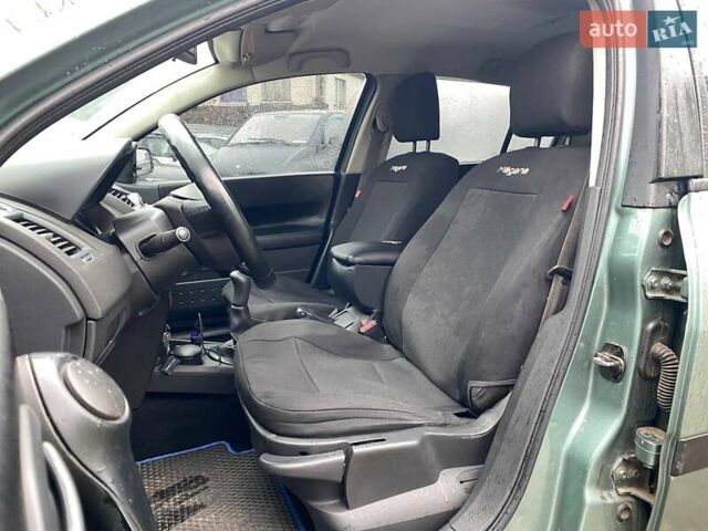 Зелений Рено Меган, об'ємом двигуна 1.39 л та пробігом 240 тис. км за 4790 $, фото 8 на Automoto.ua