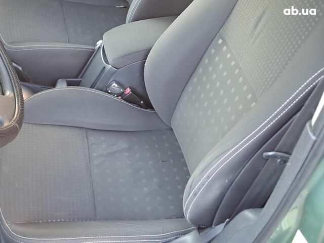 Зеленый Рено Меган, объемом двигателя 1.6 л и пробегом 230 тыс. км за 5740 $, фото 7 на Automoto.ua