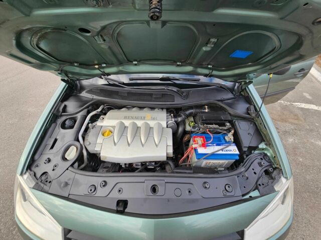 Зелений Рено Меган, об'ємом двигуна 0.16 л та пробігом 245 тис. км за 4850 $, фото 23 на Automoto.ua