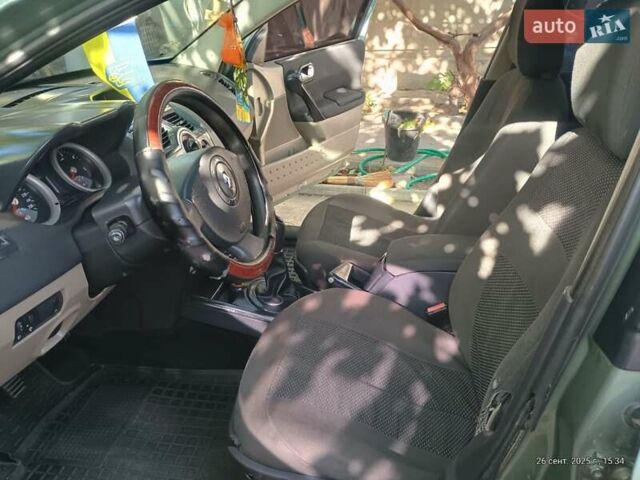 Зеленый Рено Меган, объемом двигателя 1.5 л и пробегом 352 тыс. км за 5500 $, фото 24 на Automoto.ua