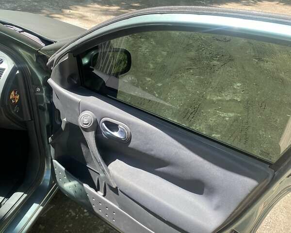 Зелений Рено Меган, об'ємом двигуна 1.4 л та пробігом 287 тис. км за 4650 $, фото 8 на Automoto.ua