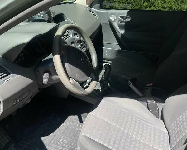Зелений Рено Меган, об'ємом двигуна 1.4 л та пробігом 287 тис. км за 4650 $, фото 12 на Automoto.ua