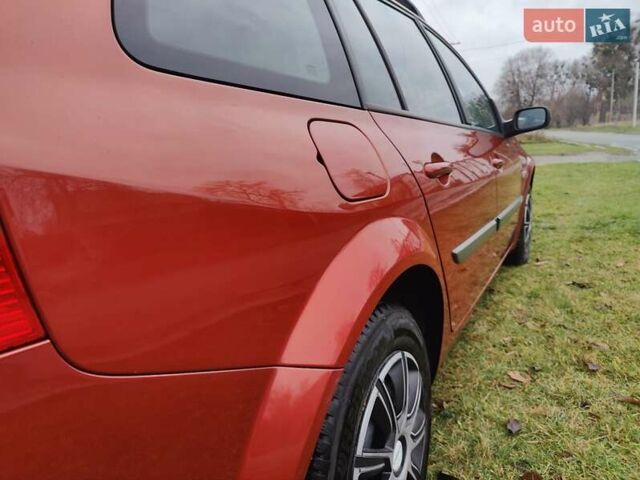 Оранжевый Рено Меган, объемом двигателя 1.6 л и пробегом 163 тыс. км за 5200 $, фото 11 на Automoto.ua