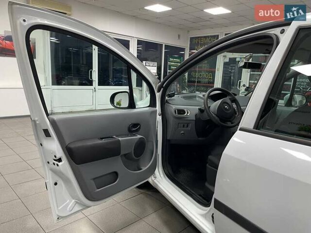 Білий Рено Модус, об'ємом двигуна 1.46 л та пробігом 202 тис. км за 3990 $, фото 14 на Automoto.ua