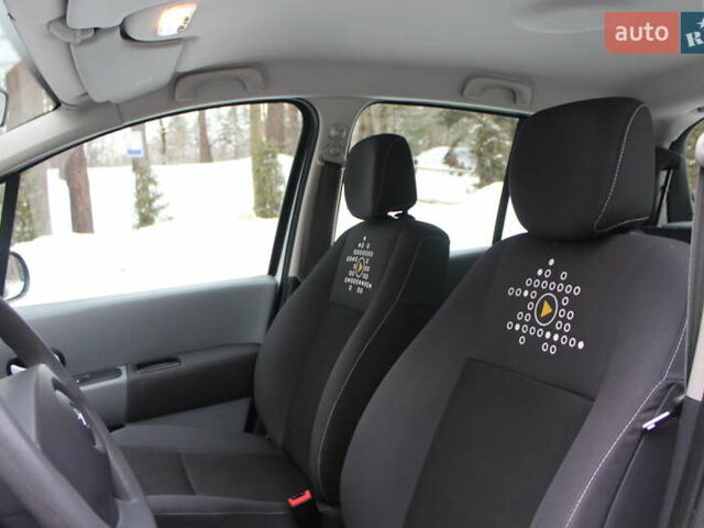 Белый Рено Модус, объемом двигателя 1.2 л и пробегом 127 тыс. км за 4990 $, фото 46 на Automoto.ua