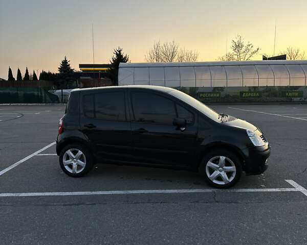 Черный Рено Модус, объемом двигателя 1.2 л и пробегом 221 тыс. км за 4650 $, фото 1 на Automoto.ua