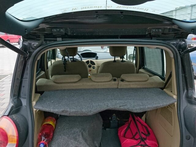 Черный Рено Модус, объемом двигателя 1.4 л и пробегом 230 тыс. км за 3200 $, фото 5 на Automoto.ua