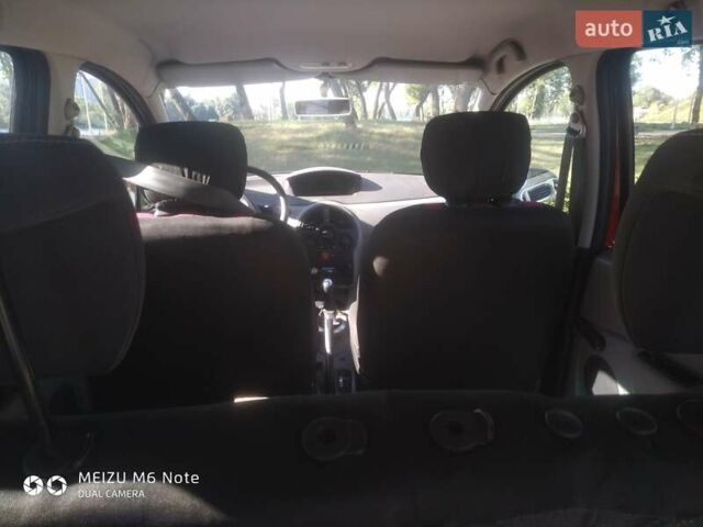 Красный Рено Модус, объемом двигателя 1.5 л и пробегом 195 тыс. км за 6100 $, фото 1 на Automoto.ua