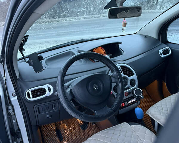 Серый Рено Модус, объемом двигателя 1.2 л и пробегом 210 тыс. км за 4100 $, фото 11 на Automoto.ua