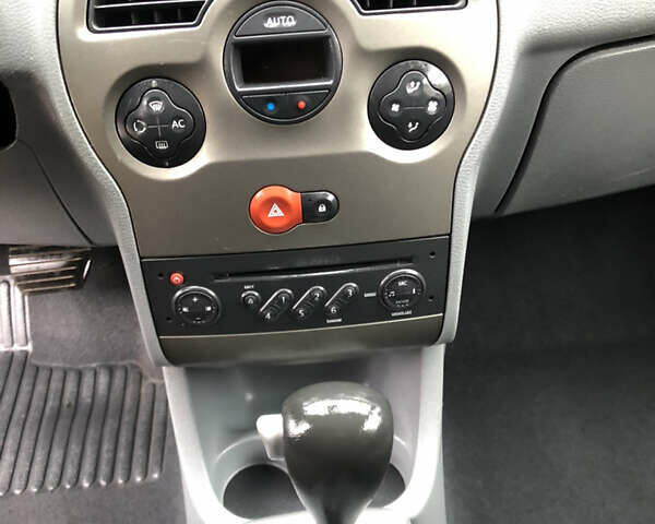 Сірий Рено Модус, об'ємом двигуна 1.6 л та пробігом 230 тис. км за 6300 $, фото 12 на Automoto.ua