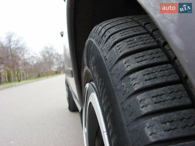 Серый Рено Модус, объемом двигателя 1.5 л и пробегом 243 тыс. км за 6799 $, фото 4 на Automoto.ua