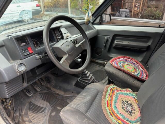 Білий Рено Рапід, об'ємом двигуна 1.6 л та пробігом 300 тис. км за 999 $, фото 11 на Automoto.ua