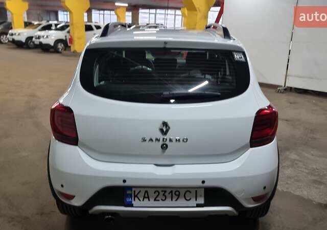 Белый Рено Сандеро СтэпВэй, объемом двигателя 0.9 л и пробегом 83 тыс. км за 8500 $, фото 12 на Automoto.ua