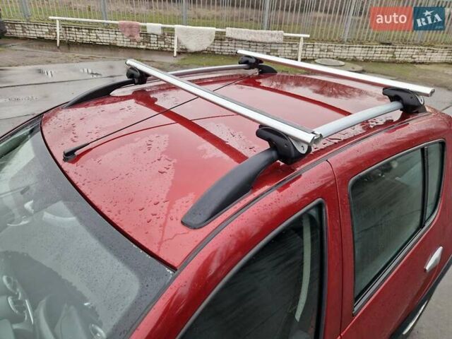 Красный Рено Сандеро СтэпВэй, объемом двигателя 1.6 л и пробегом 102 тыс. км за 6600 $, фото 9 на Automoto.ua