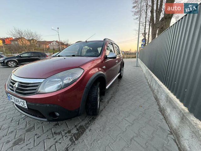 Красный Рено Сандеро СтэпВэй, объемом двигателя 1.6 л и пробегом 134 тыс. км за 7000 $, фото 4 на Automoto.ua