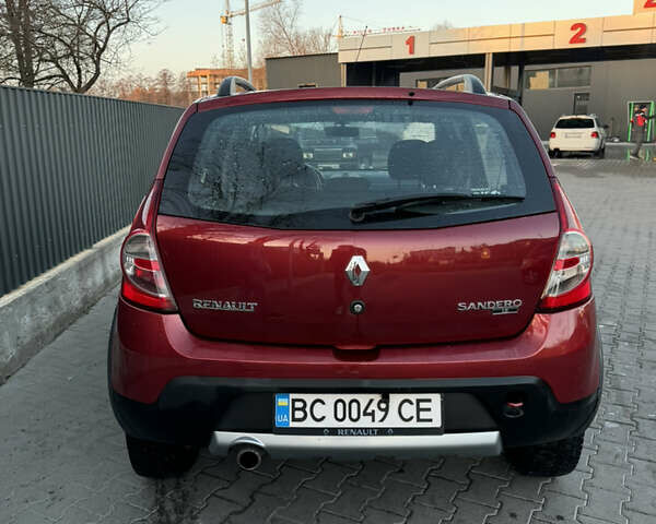 Красный Рено Сандеро СтэпВэй, объемом двигателя 1.6 л и пробегом 134 тыс. км за 7000 $, фото 3 на Automoto.ua