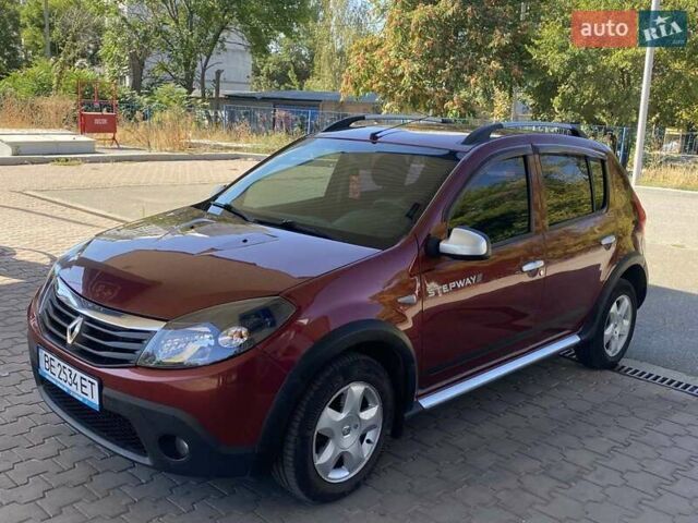 Красный Рено Сандеро СтэпВэй, объемом двигателя 1.6 л и пробегом 180 тыс. км за 6999 $, фото 18 на Automoto.ua