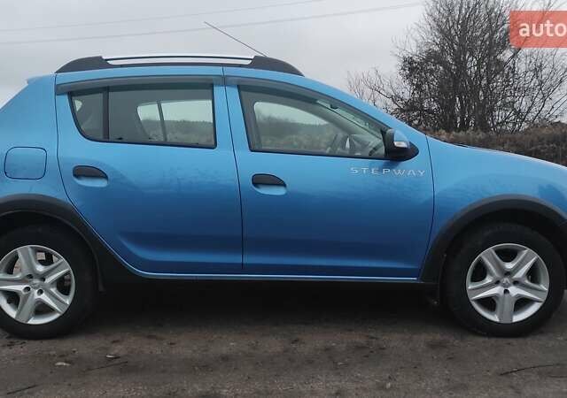 Синій Рено Сандеро СтепВей, об'ємом двигуна 1.6 л та пробігом 115 тис. км за 8300 $, фото 6 на Automoto.ua