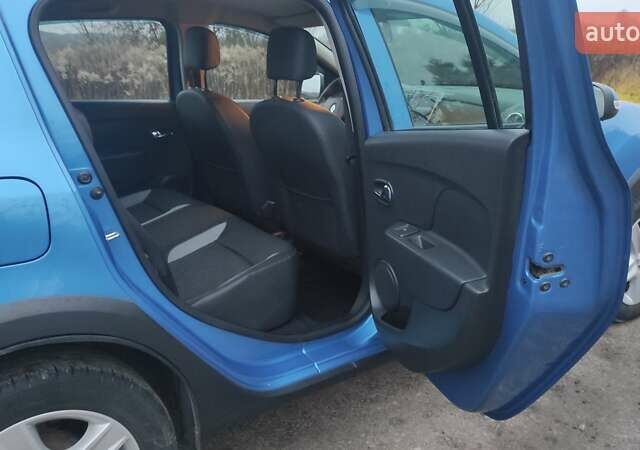 Синій Рено Сандеро СтепВей, об'ємом двигуна 1.6 л та пробігом 115 тис. км за 8300 $, фото 20 на Automoto.ua
