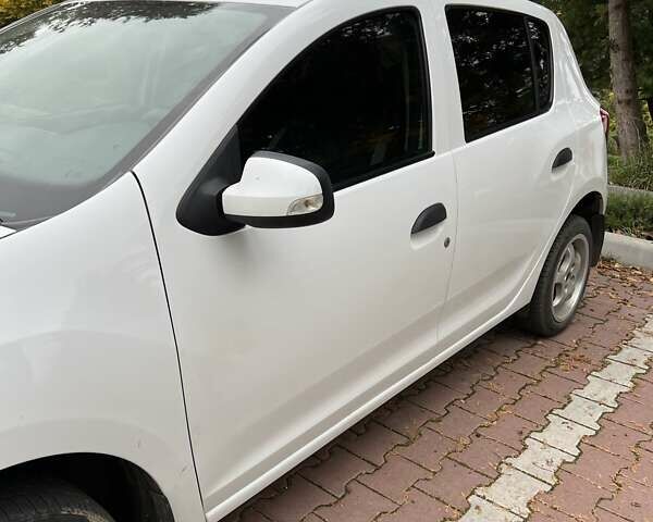 Білий Рено Сандеро, об'ємом двигуна 1.15 л та пробігом 167 тис. км за 5990 $, фото 2 на Automoto.ua