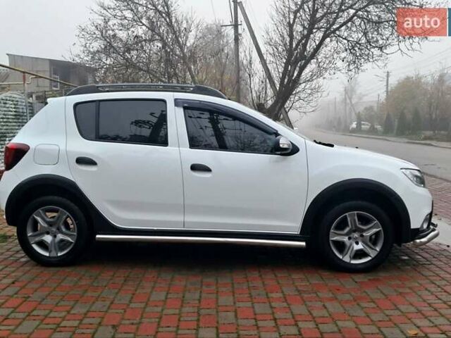 Білий Рено Сандеро, об'ємом двигуна 0.9 л та пробігом 135 тис. км за 8700 $, фото 7 на Automoto.ua