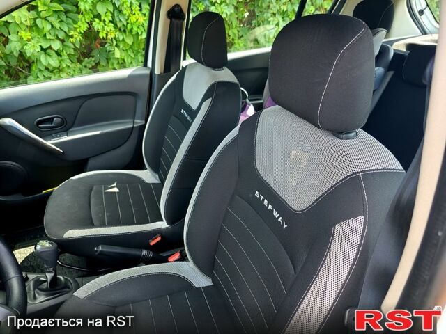 Белый Рено Сандеро, объемом двигателя 1 л и пробегом 57 тыс. км за 9500 $, фото 4 на Automoto.ua