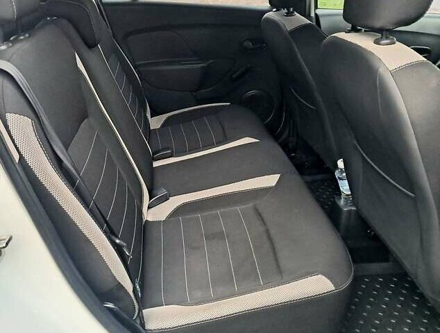 Білий Рено Сандеро, об'ємом двигуна 0.9 л та пробігом 135 тис. км за 8700 $, фото 15 на Automoto.ua
