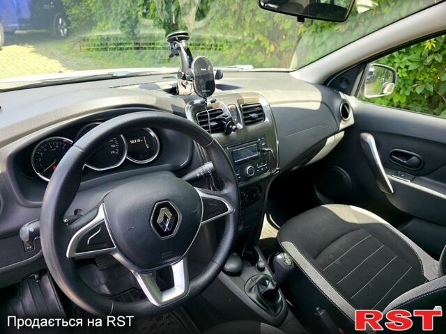 Белый Рено Сандеро, объемом двигателя 1 л и пробегом 57 тыс. км за 9500 $, фото 2 на Automoto.ua