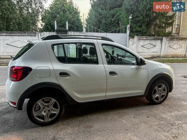 Білий Рено Сандеро, об'ємом двигуна 0.9 л та пробігом 157 тис. км за 9000 $, фото 25 на Automoto.ua