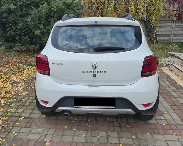 Белый Рено Сандеро, объемом двигателя 1.46 л и пробегом 136 тыс. км за 9500 $, фото 2 на Automoto.ua