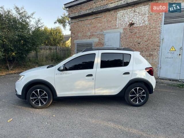 Білий Рено Сандеро, об'ємом двигуна 1.46 л та пробігом 130 тис. км за 8999 $, фото 5 на Automoto.ua