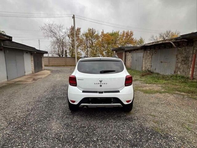 Білий Рено Сандеро, об'ємом двигуна 0.9 л та пробігом 57 тис. км за 9500 $, фото 6 на Automoto.ua