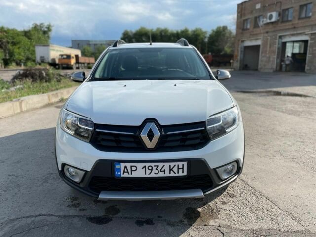 Белый Рено Сандеро, объемом двигателя 1 л и пробегом 86 тыс. км за 10699 $, фото 1 на Automoto.ua