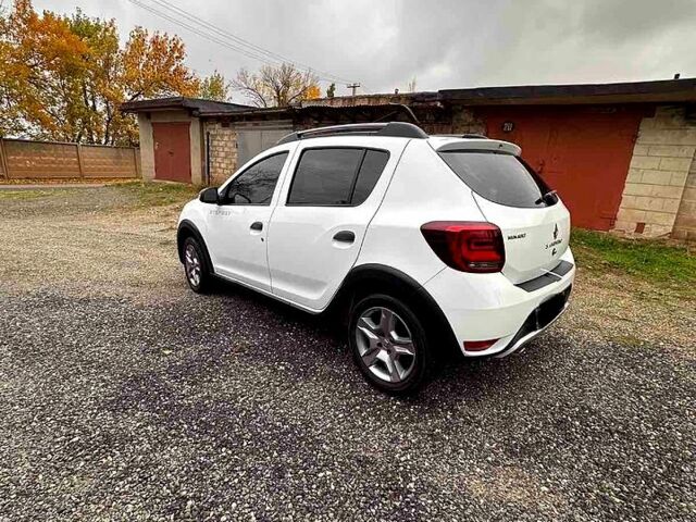 Білий Рено Сандеро, об'ємом двигуна 0.9 л та пробігом 57 тис. км за 9500 $, фото 5 на Automoto.ua