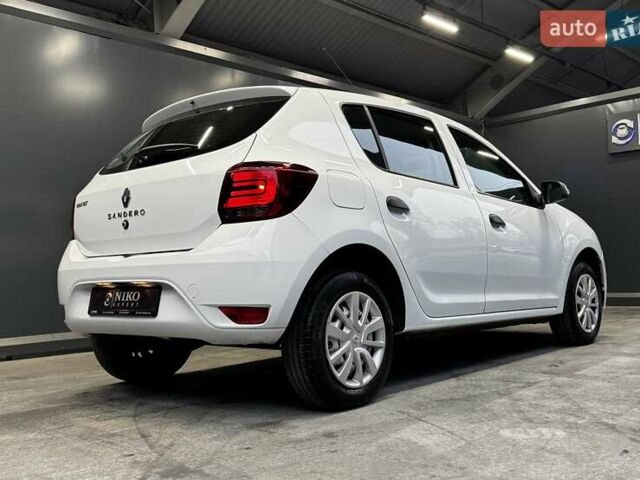 Белый Рено Сандеро, объемом двигателя 1.5 л и пробегом 73 тыс. км за 8500 $, фото 18 на Automoto.ua