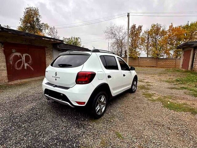 Білий Рено Сандеро, об'ємом двигуна 0.9 л та пробігом 57 тис. км за 9500 $, фото 4 на Automoto.ua