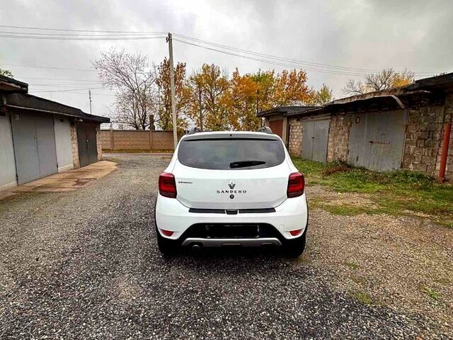 Білий Рено Сандеро, об'ємом двигуна 0.9 л та пробігом 57 тис. км за 9500 $, фото 6 на Automoto.ua