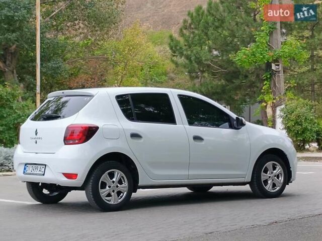 Белый Рено Сандеро, объемом двигателя 1 л и пробегом 57 тыс. км за 9200 $, фото 31 на Automoto.ua