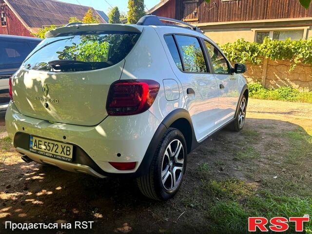 Белый Рено Сандеро, объемом двигателя 1 л и пробегом 48 тыс. км за 11000 $, фото 1 на Automoto.ua