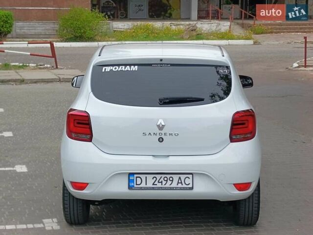 Білий Рено Сандеро, об'ємом двигуна 1 л та пробігом 57 тис. км за 7000 $, фото 34 на Automoto.ua