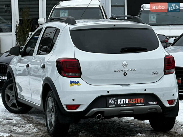 Білий Рено Сандеро, об'ємом двигуна 1.46 л та пробігом 92 тис. км за 13300 $, фото 9 на Automoto.ua